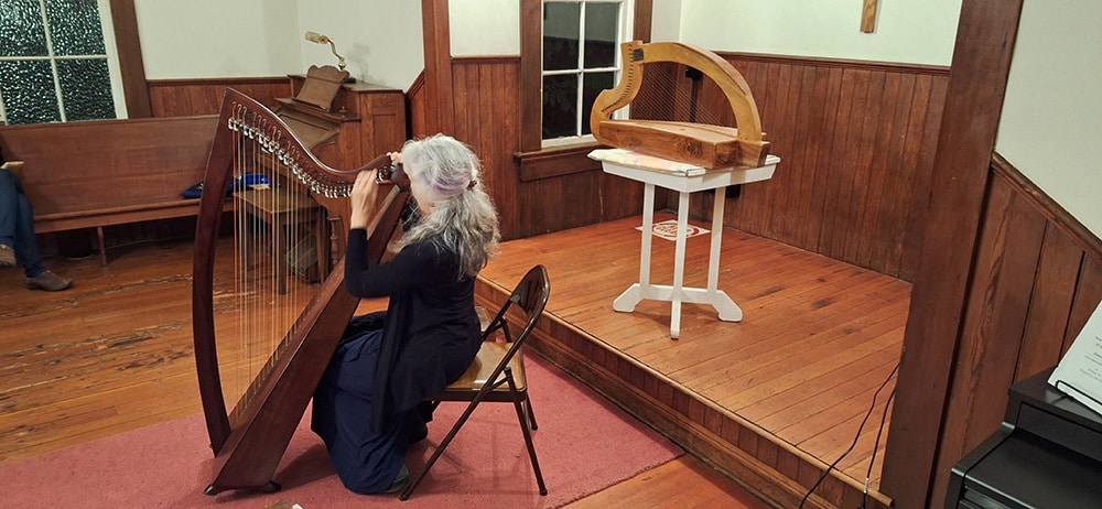 harpist playing inside church